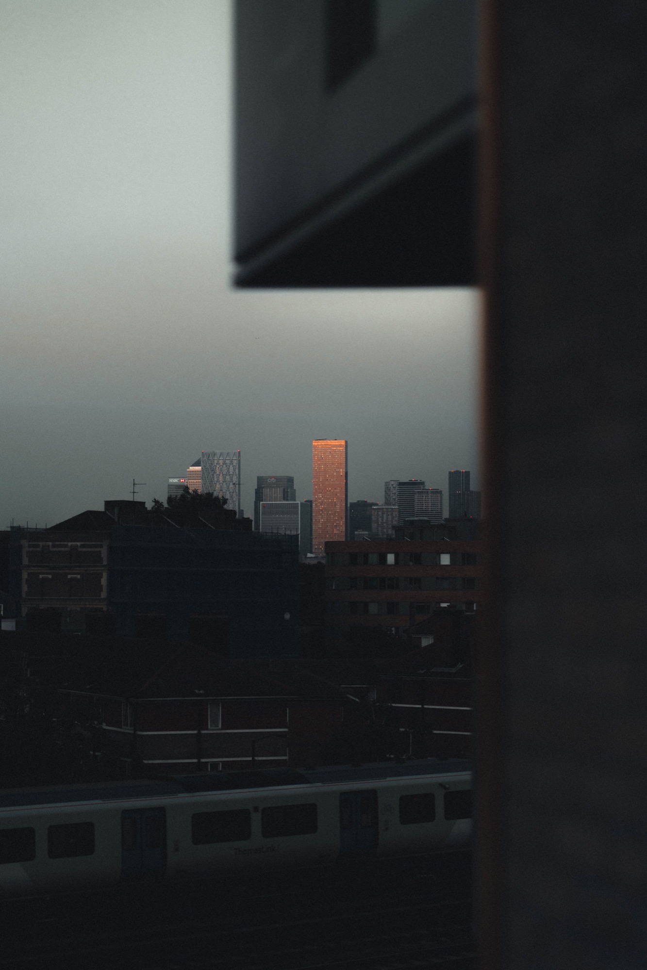 Cityscape photography - Canary Wharf through window
