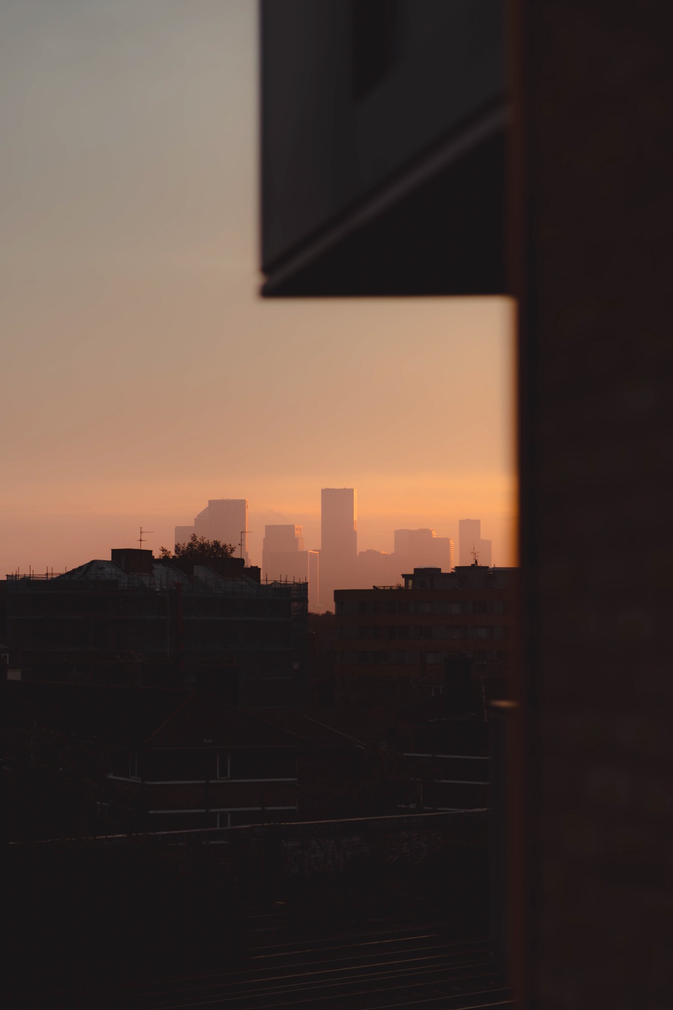 Cityscape photography - Canary Wharf window sunset