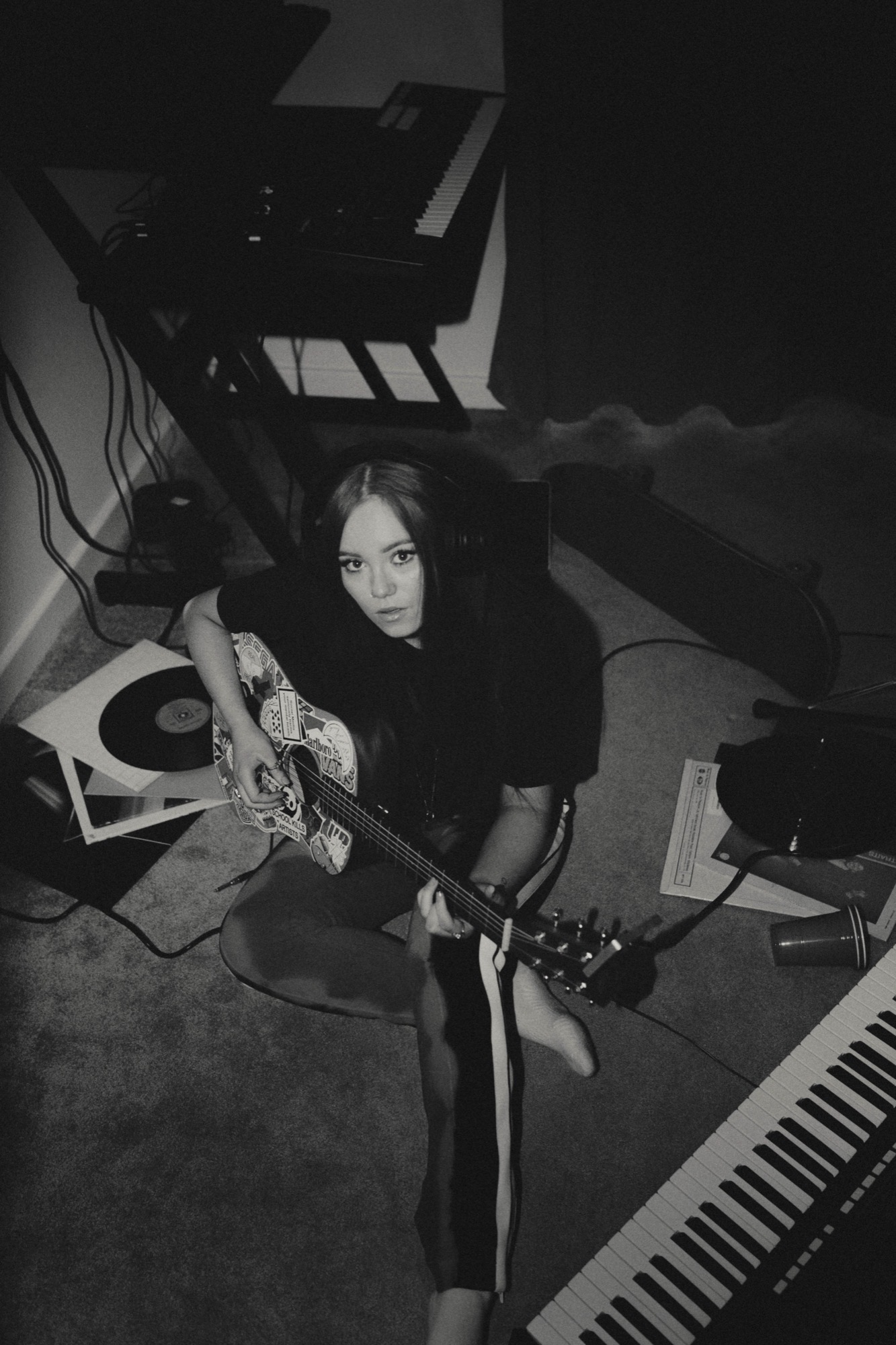 Portrait photography - woman with guitar in studio