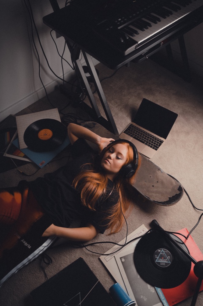 Portrait photography - woman with vinyl records
